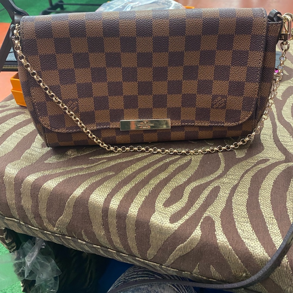 LV slang shoulder bag